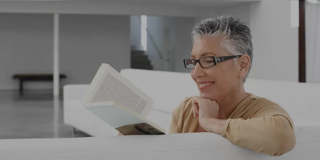 Elderly Women Reading a Book